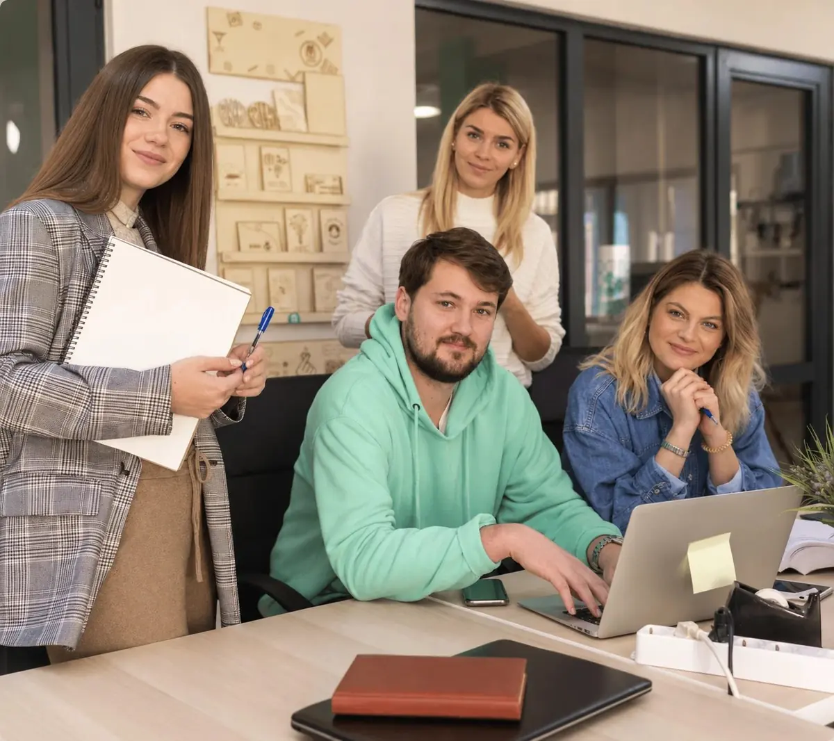 Nancy, Brian, Samantha and Ann of the AdzenX team in the office